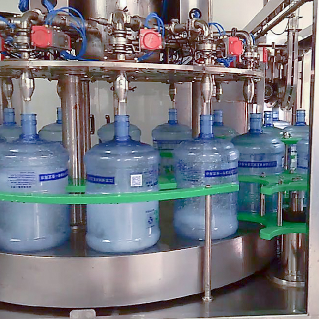 Rotary filling machine (off-port metering rotary filling machine)